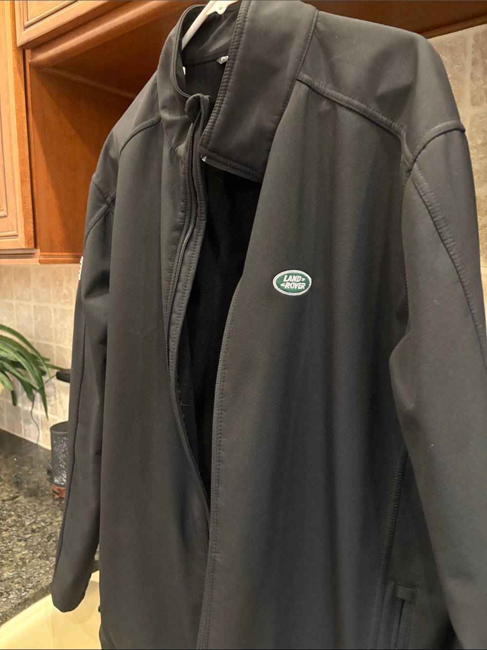 Land Rover Black Waterproof Jacket w/British flag on right sleeve. XL